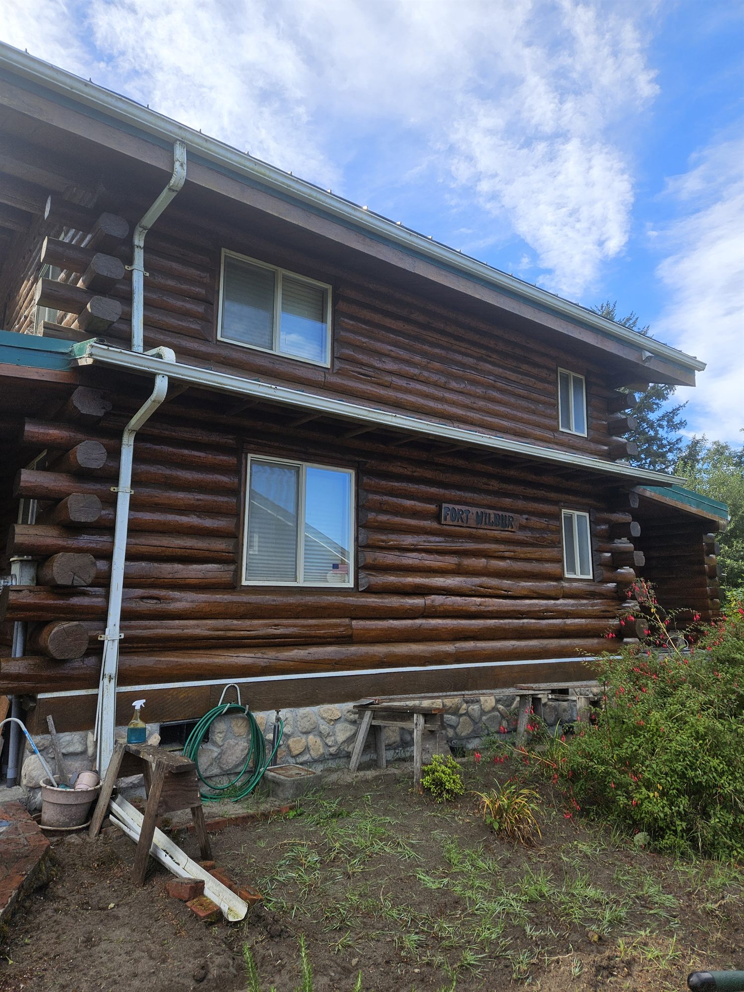 10410 Pacific Way, a hand-built log cabin among shore pines on the Long Beach peninsula